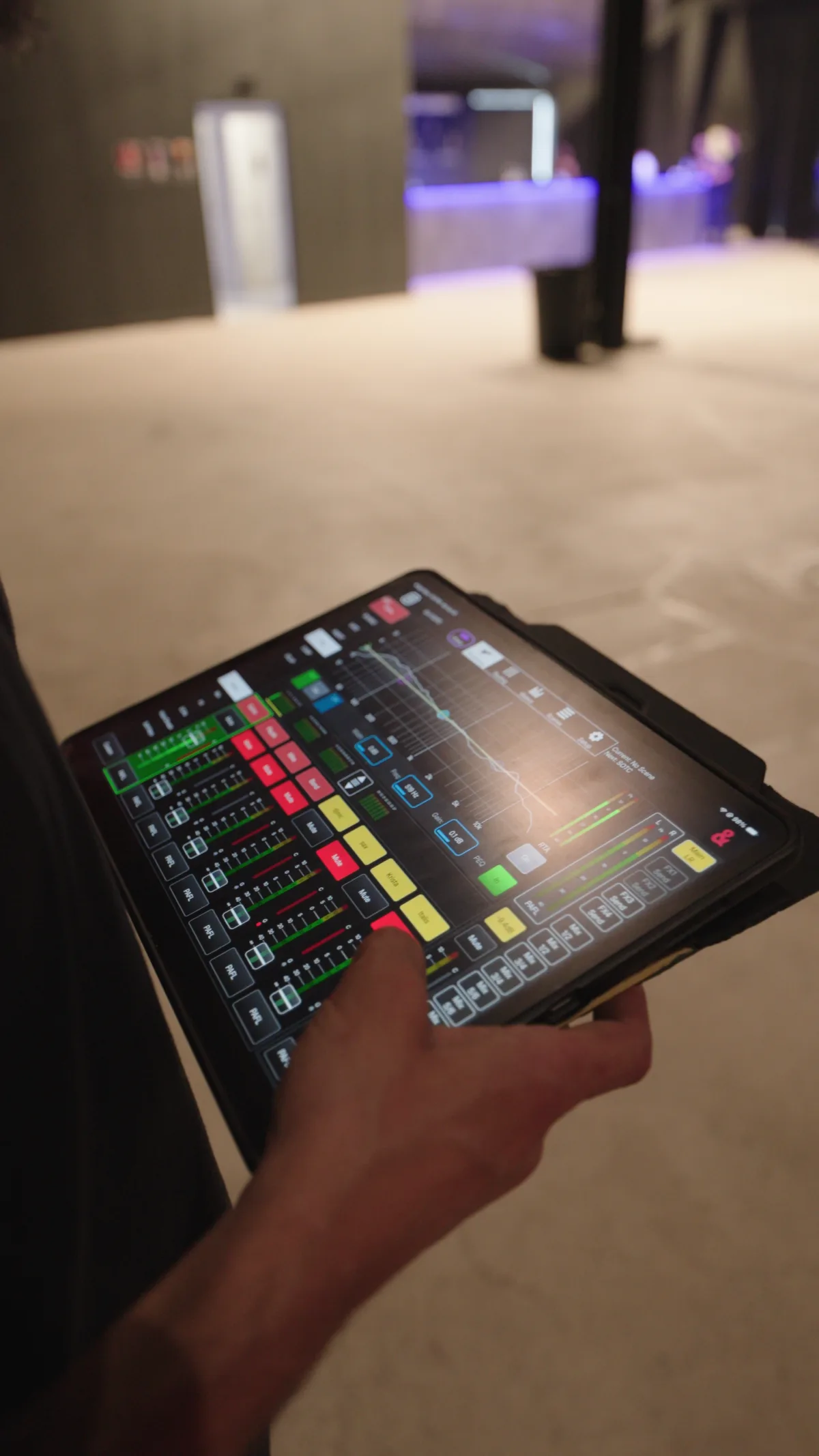 In-house sound engineer running live mix control during a Demo Room event